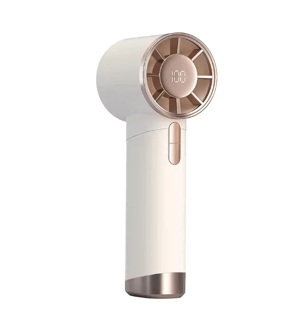 Handheld personal fan being used outdoors