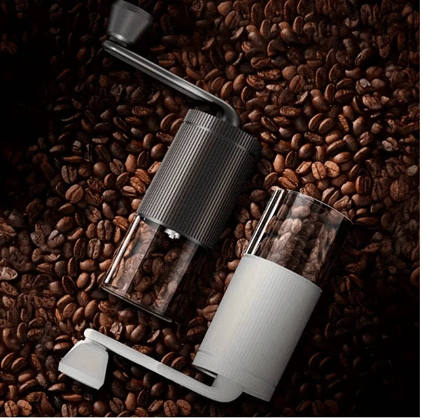Manual coffee bean grinder with hand crank