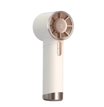 Handheld personal fan being used outdoors