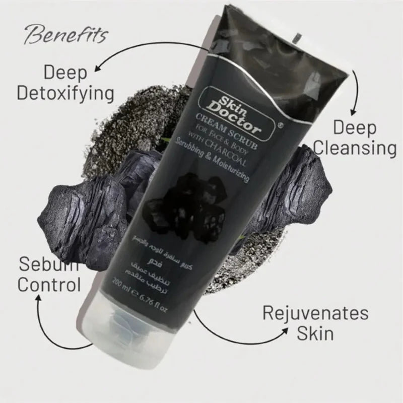 Charcoal cream scrub being applied to skin